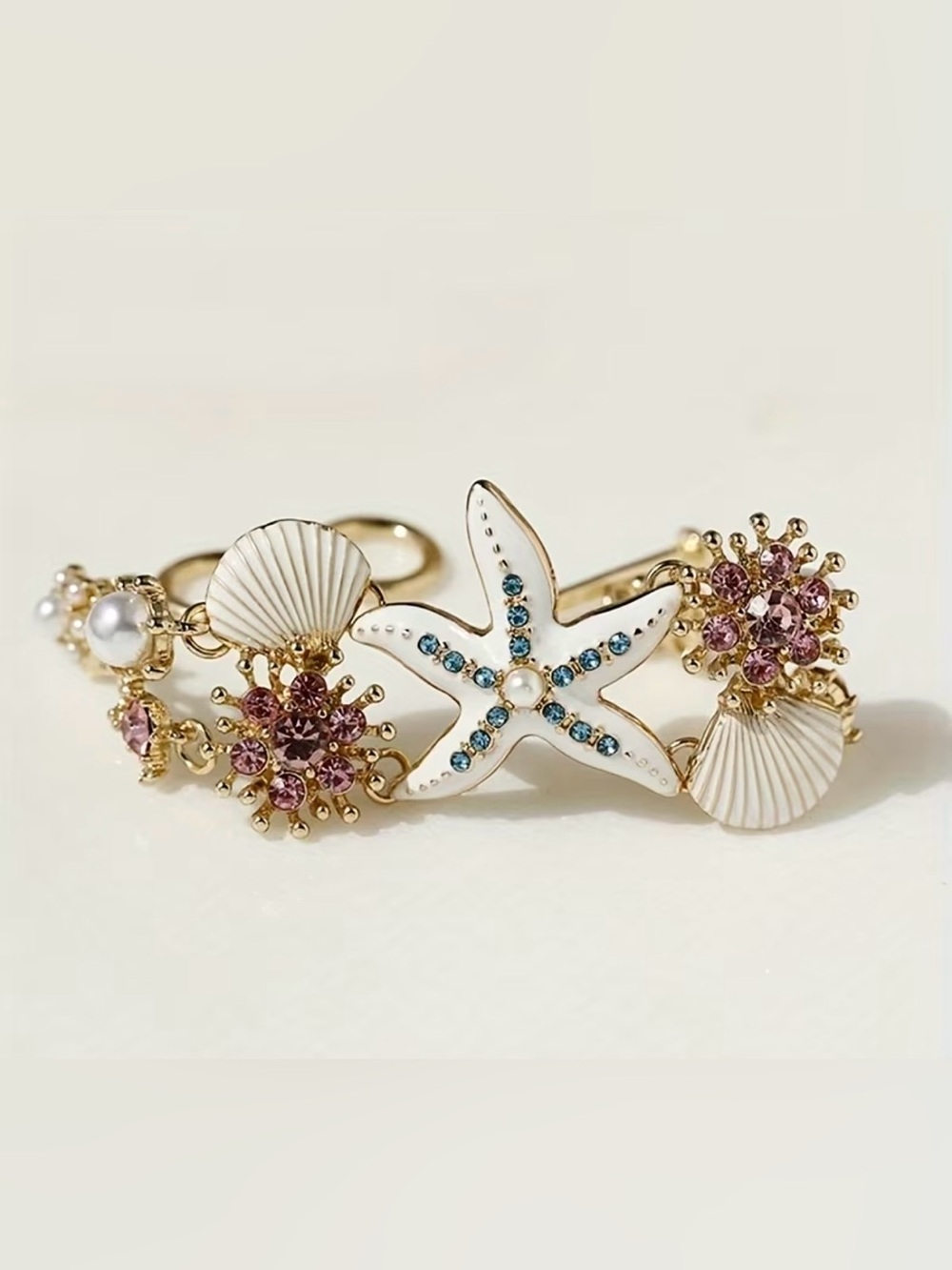 Gold Seashell & Starfish Charm Bracelet with White Enamel and Blue/Pink Crystals